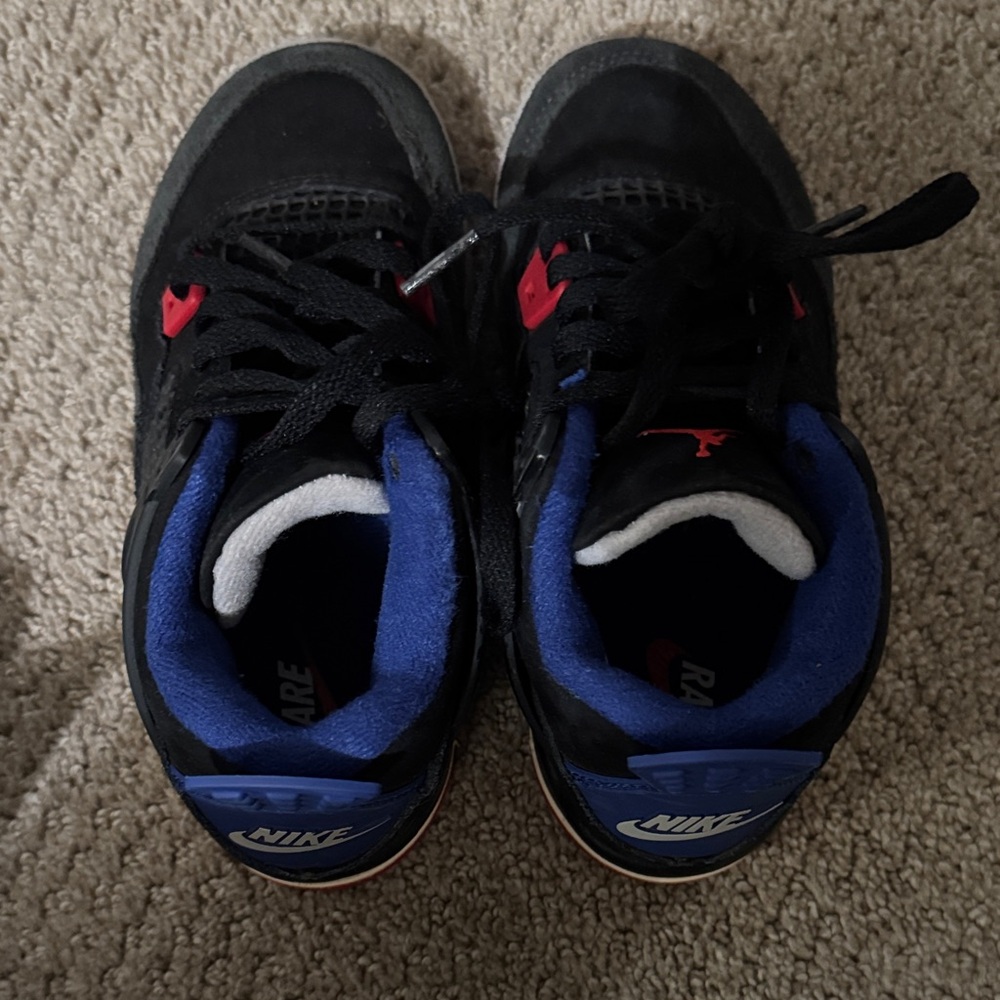 Jordan Nike Kids Black and Red Sneakers with Blue Accents